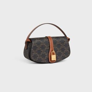 CELINE Tabou Clutch on strap in Triomphe canvas and Calfskin Tan